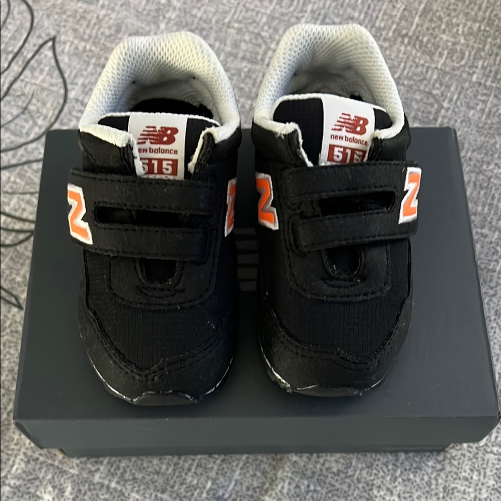 New Balance Black and Orange Sneakers with Breathable Mesh